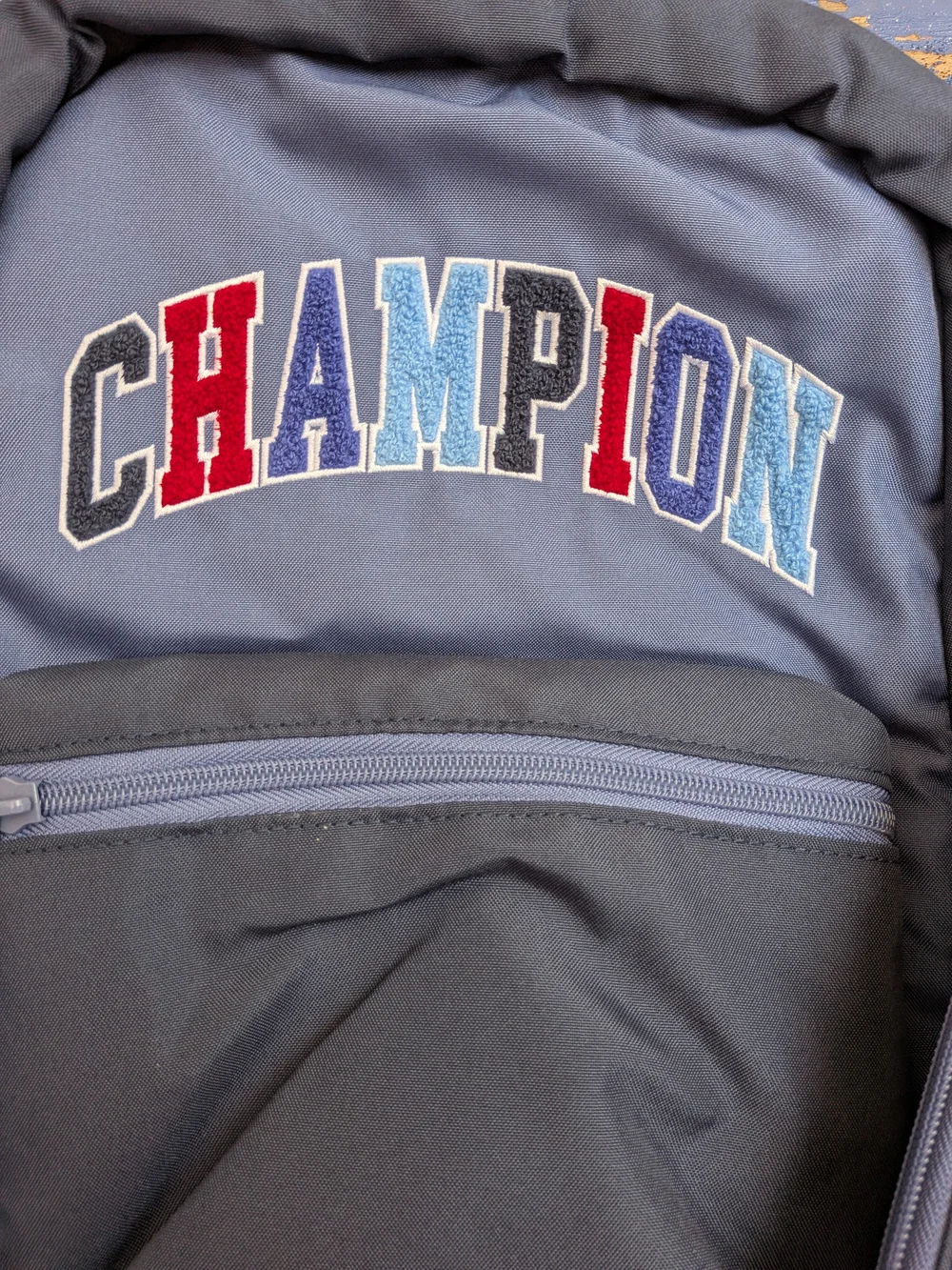 Champion Navy Blue Backpack with Multicolor Logo and Matching Pouch